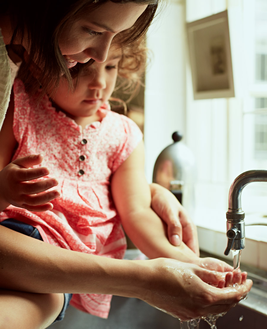 Mother and Daughter Washing Hands